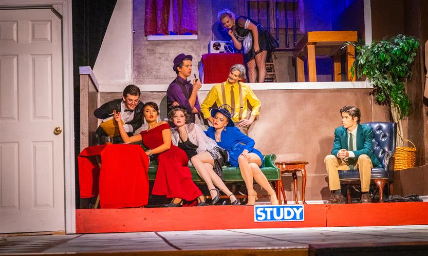 Students perform Clue onstage